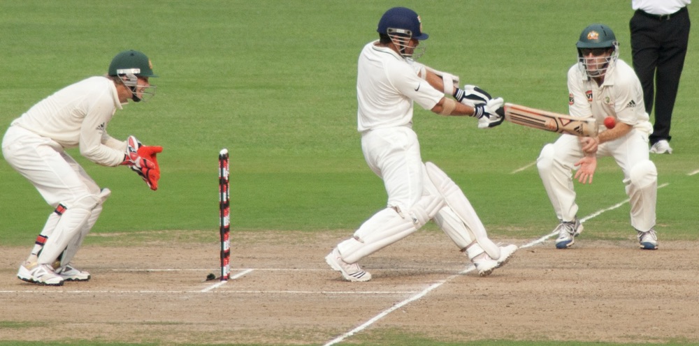 Sachin Tendulkar drives the ball on day two of the second Test against Australia in Bangalore, 10 October 2010, as stated by the source.